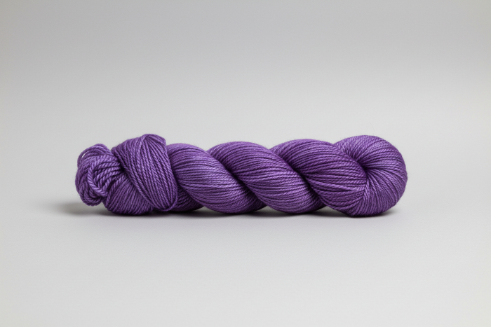 Amethyst Purple skein of yarn on a white background