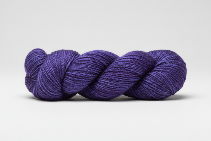 Indigo Blue skein of yarn on a white background